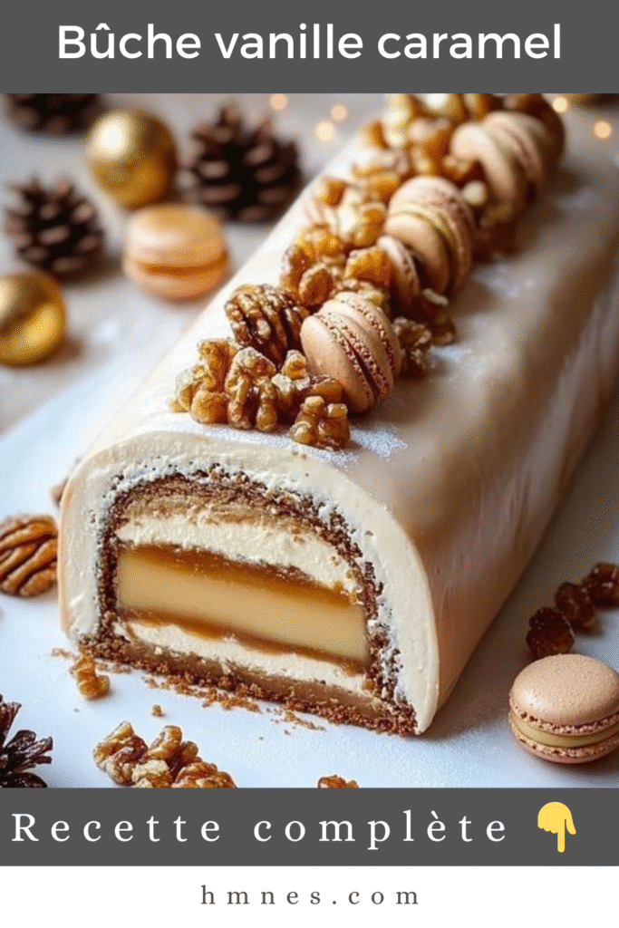 Bûche vanille caramel aux noix décorée de macarons, noix de pécan et sucre glace, présentée sur un plat de fête pour un dessert de Noël gourmand.